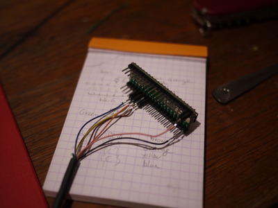 The completed adapter. The spoon was used to unplug the board from a piece of breadboard. And for breakfast, earlier.